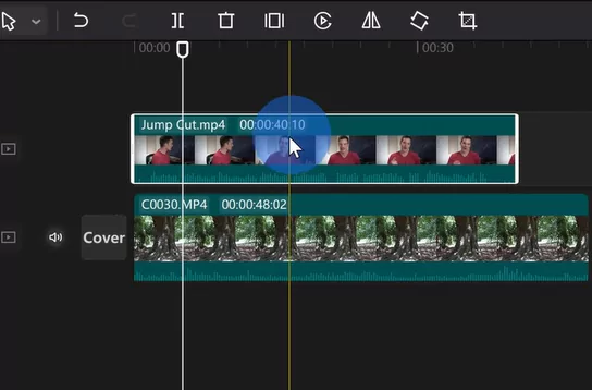 Multi-layer timeline editing interface in CapCut app showing video and audio tracks